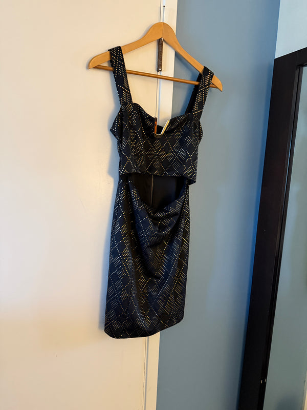 Nikibiki black peekaboo mini dress with gold studs