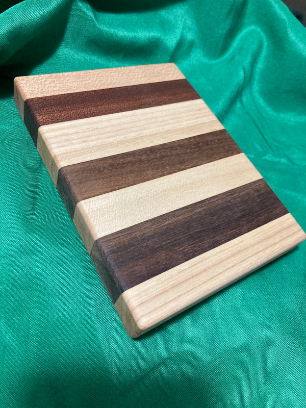 Wood trivet. Small cutting board with feet. Charcuterie boards. Handcrafted reclaimed wood. Plant stand. Display tray.Reclaimed maple. Walnut . Sapele wood.