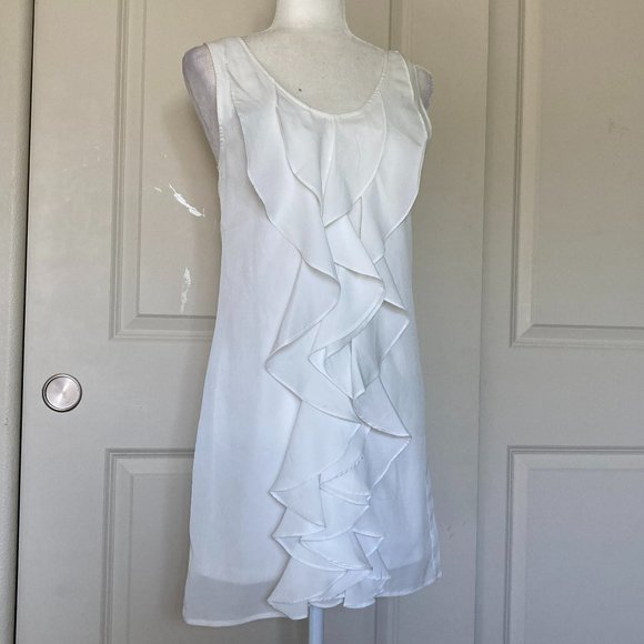 Francesca's white sleeveless ruffle front sheath dress