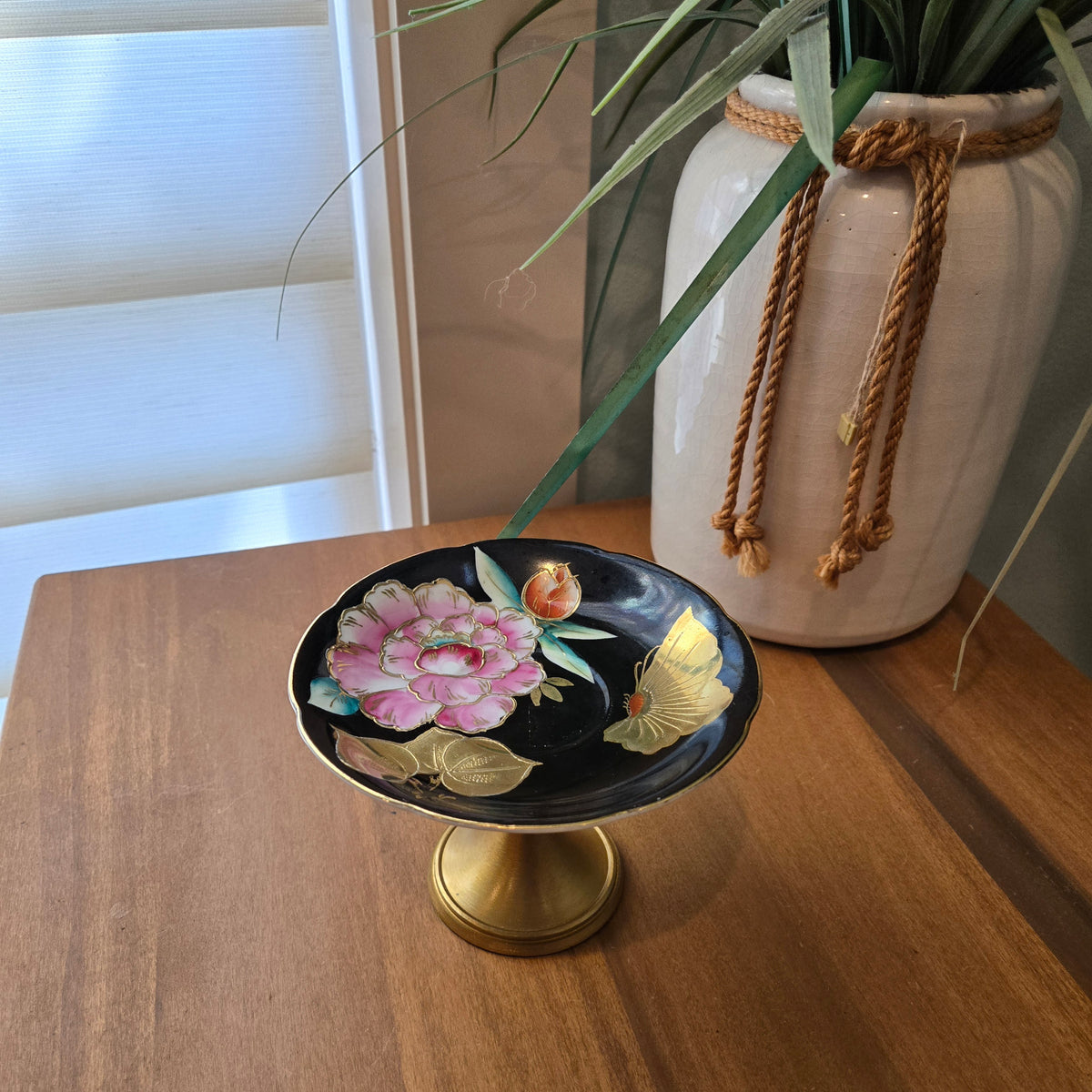 black and brass jewelry dish