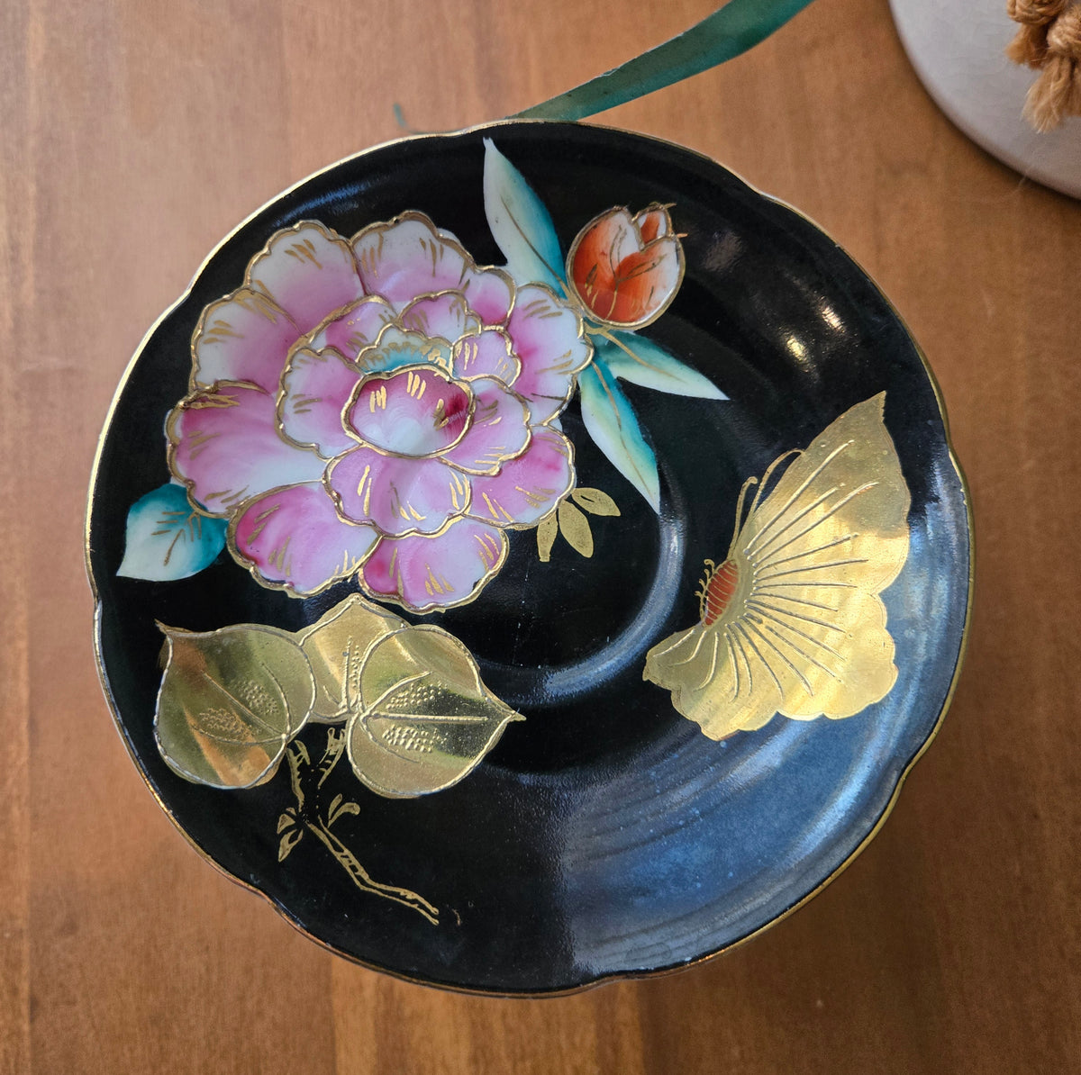 black and brass jewelry dish