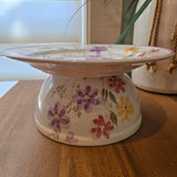 purple flower plant stand