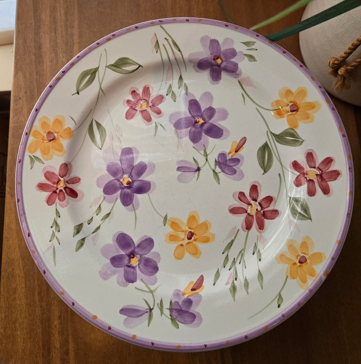 purple flower plant stand