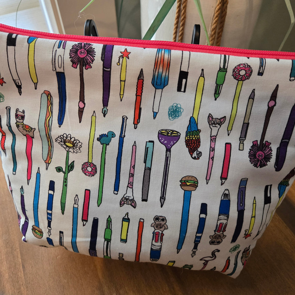 random pens themed travel bag