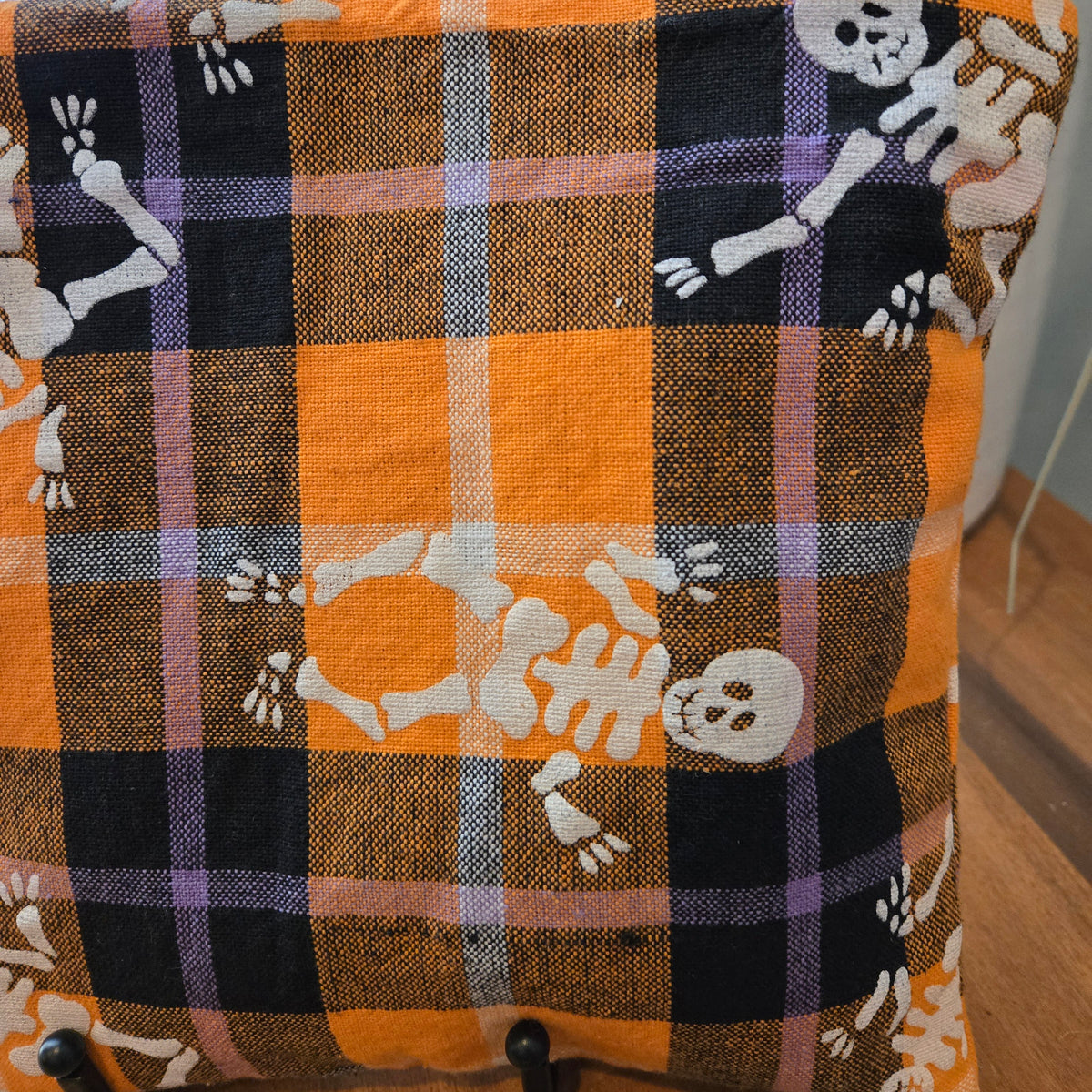 orange plaid with skeletons zipper pouch