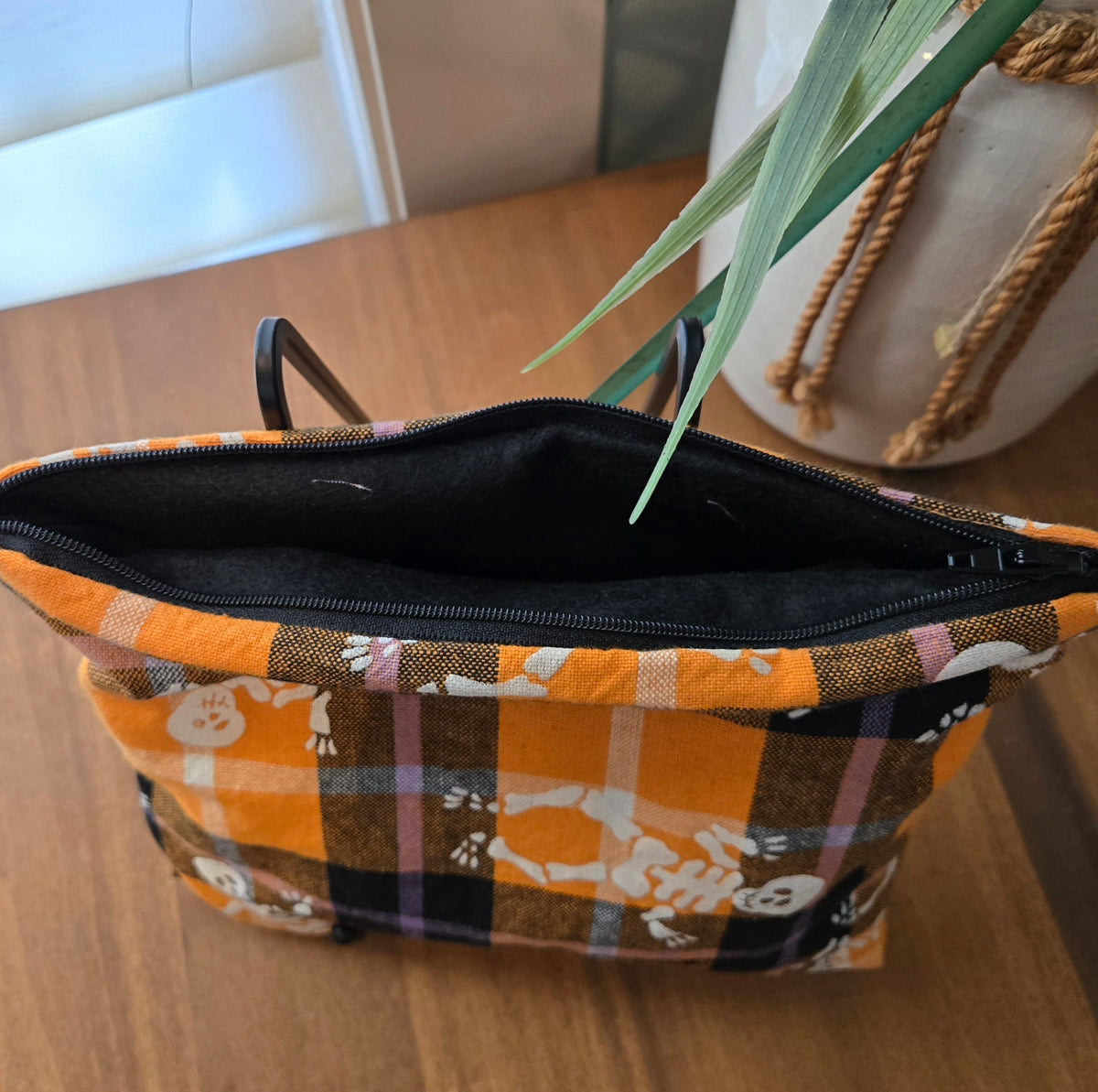 orange plaid with skeletons zipper pouch