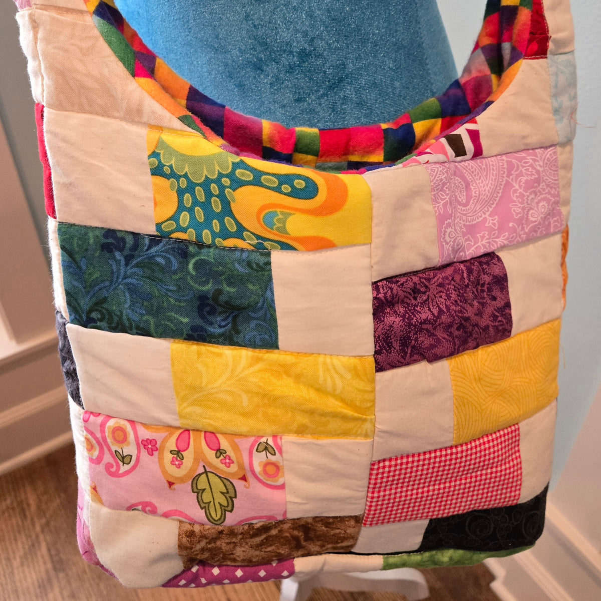 upcycled cream quilt sling purse