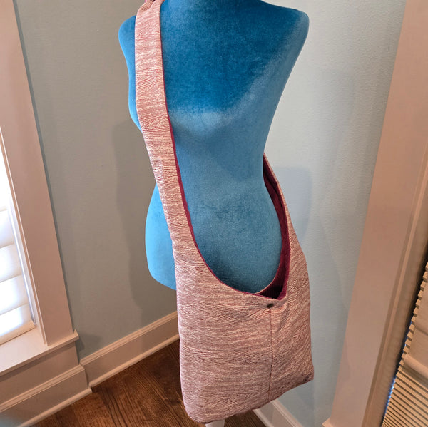 pink wood grain sling purse