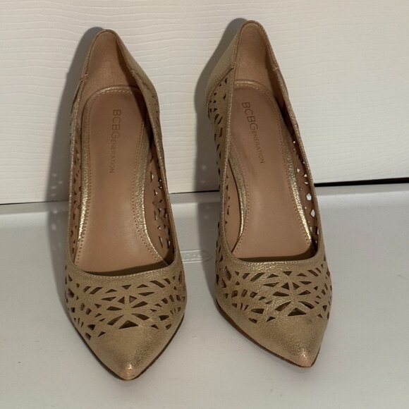 BCBGeneration gold cutout pumps
