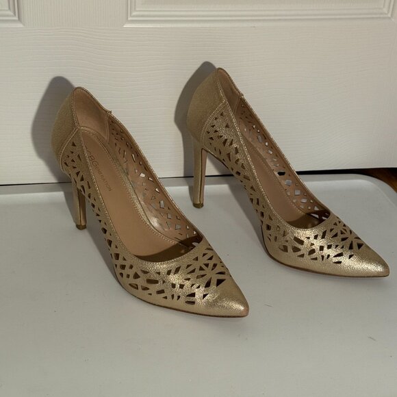 BCBGeneration gold cutout pumps