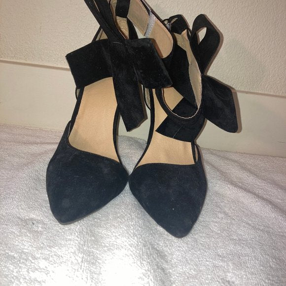 Black suede heels with detachable bows