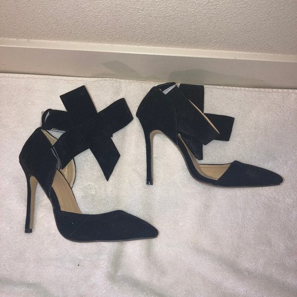 Black suede heels with detachable bows