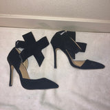 Black suede heels with detachable bows