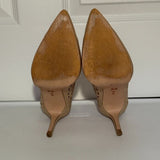 BCBGeneration gold cutout pumps