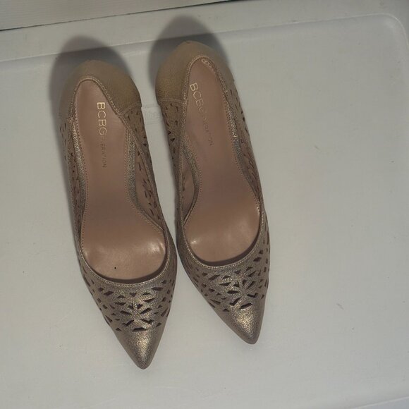 BCBGeneration gold cutout pumps