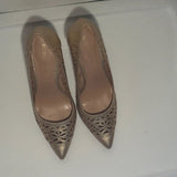 BCBGeneration gold cutout pumps
