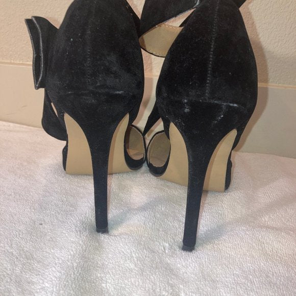 Black suede heels with detachable bows