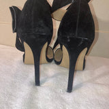 Black suede heels with detachable bows