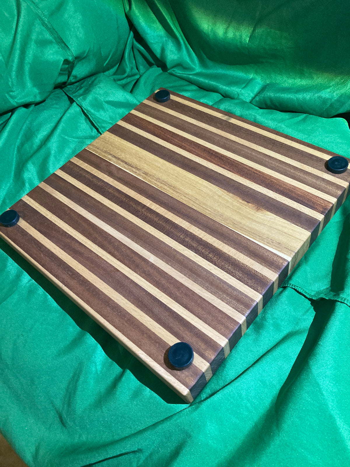 Large cutting board with juice groove. Handcrafted reclaimed wood. Jatoba wood. Hickory wood. Board with feet.