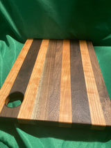 Medium wood Charcuterie board w/ hanging hole. Food prep. Hanging. Reclaimed wood. Handcrafted. High quality. Handmade gift. Walnut wood. Cherry wood.