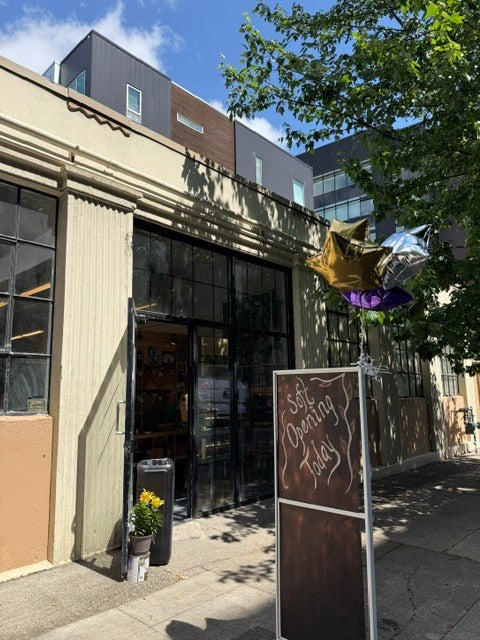 Lost & Found storefront with soft opening sign